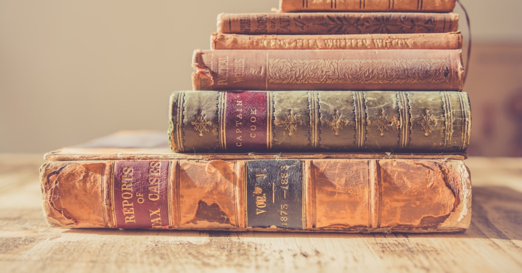 Stack of old books on the table