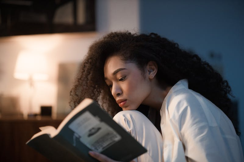 A girl is reading a book