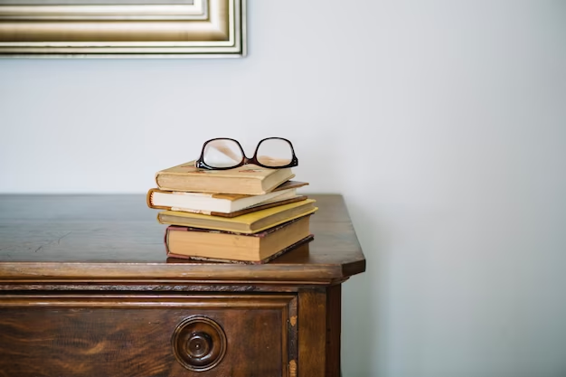 Stack of books on nightstand